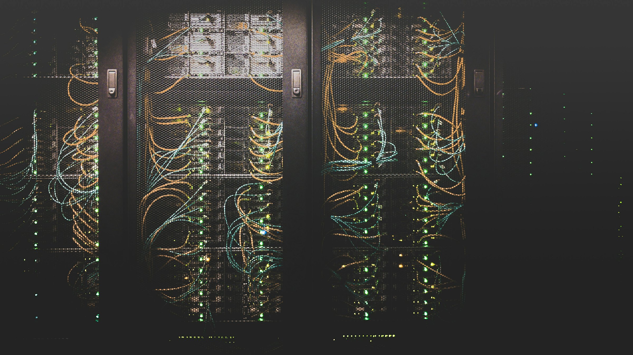 Rows of server racks in a data hall